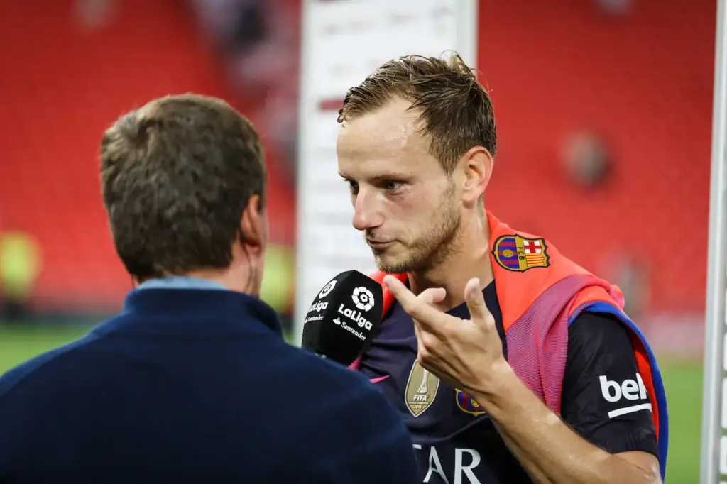 Reporter Interviewing a Football Player 